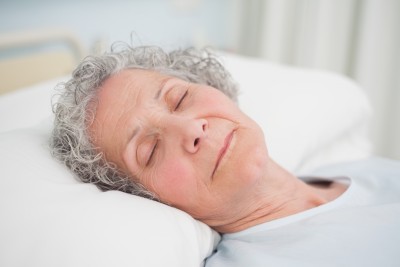elderly senior citizen woman sleeping well and happily