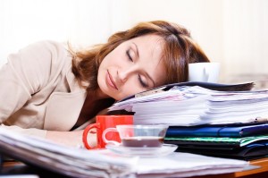 Falling Asleep At Work? Survey Reveals You Aren' class=